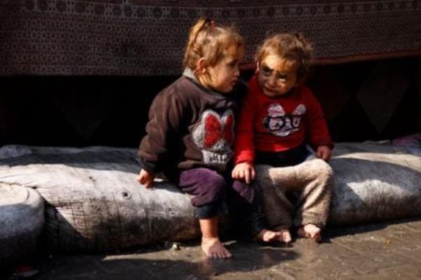 Two displaced girls in a refugee camp in Rafah on Monday.